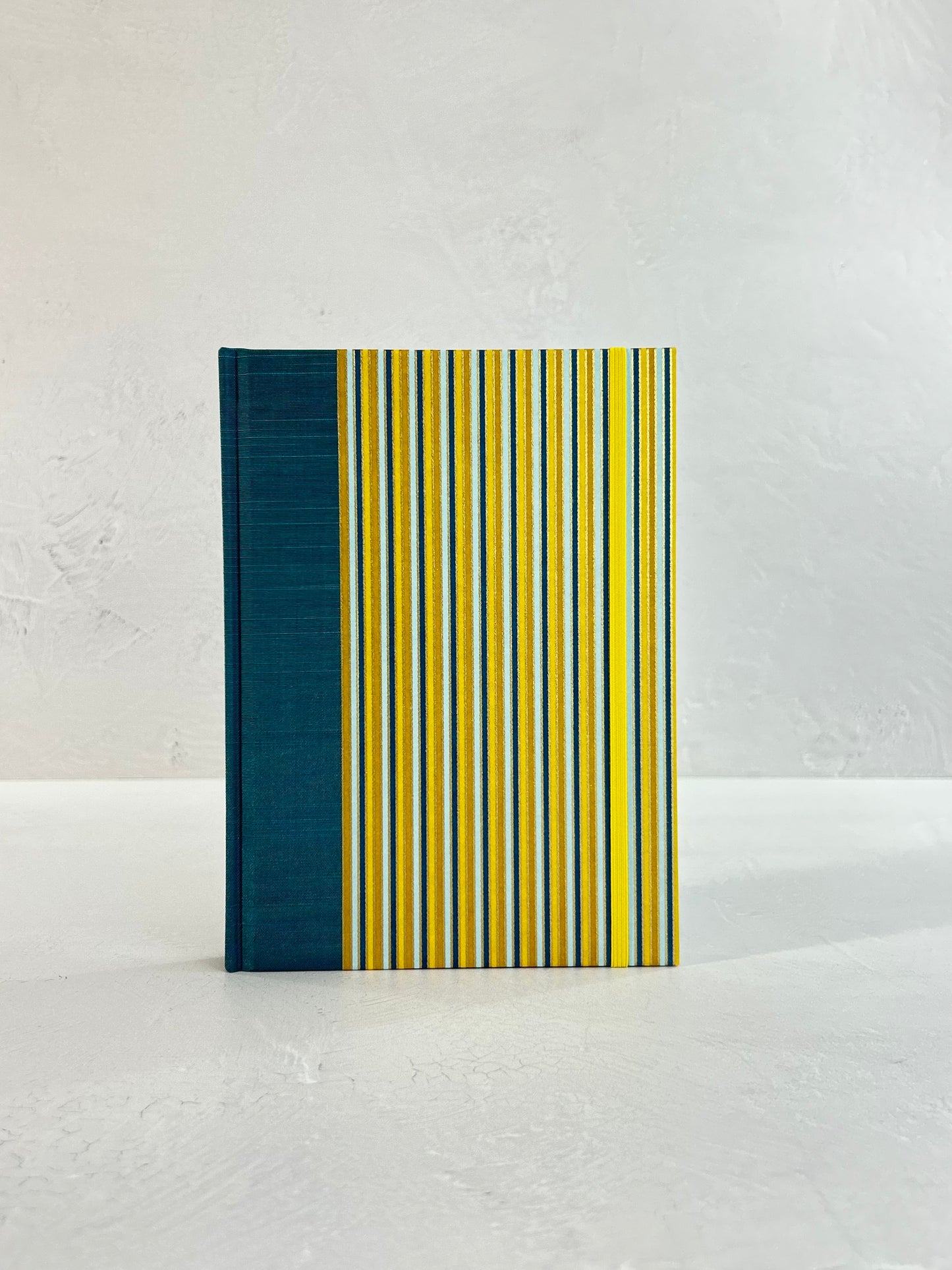 A5 160-page Hardcover Journal finished in Marine Blue Japanese book cloth and pinstripe Chiyogami Paper