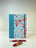 A5 160-page Hardcover Notebook finished in Red and White Cherry Blossom Chiyogami Paper