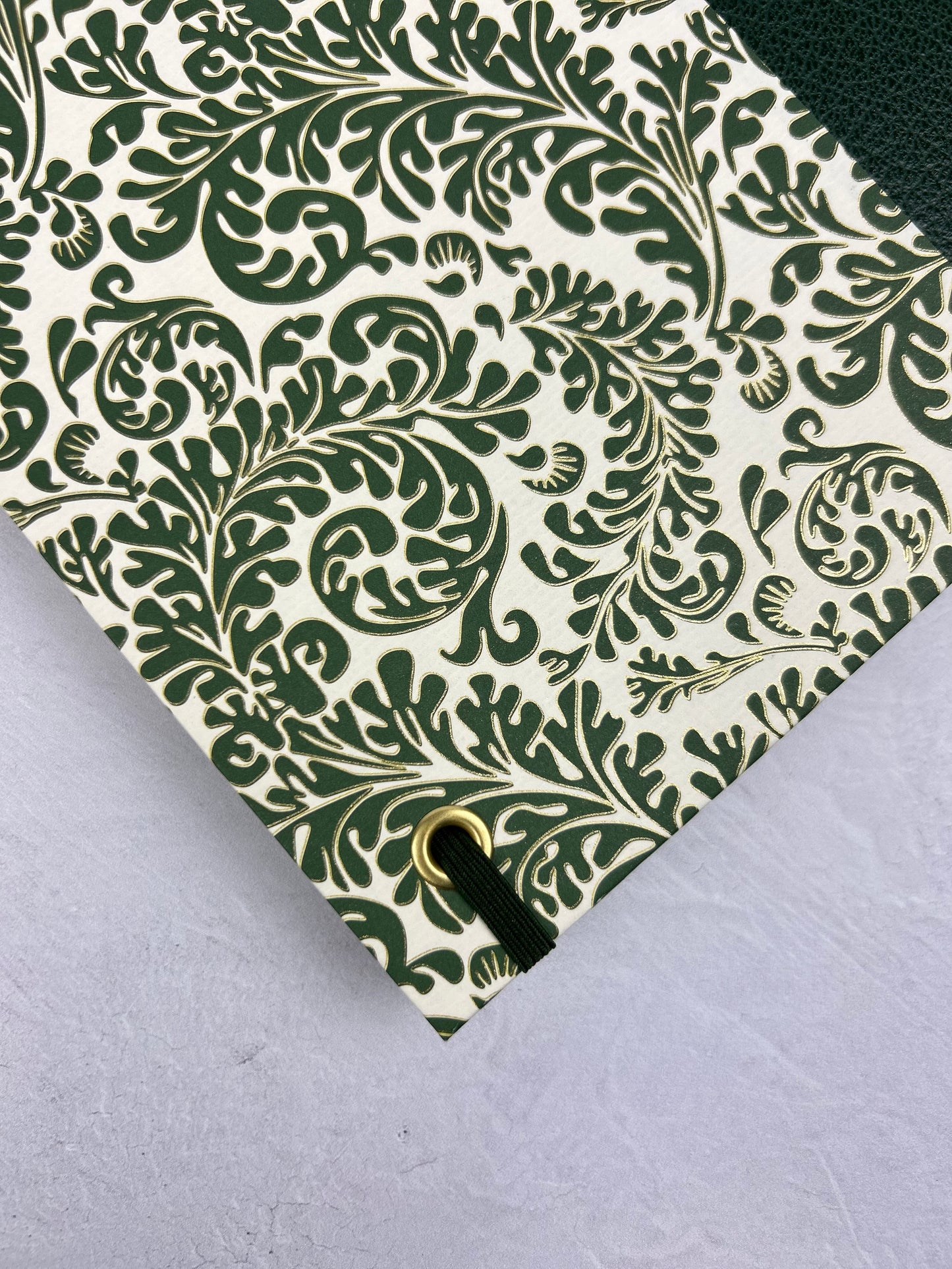 A5 160-page Hardcover Journal finished in Green Vaux Leather and green and gold fern Italian Florentine print