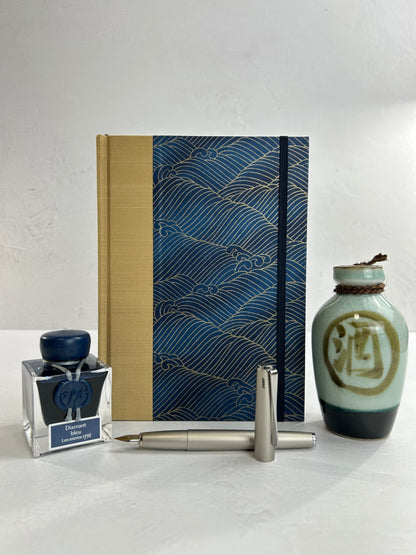 A5 160-page Hardcover Journal finished in soft gold Japanese book cloth and golden waves on blue Chiyogami Paper