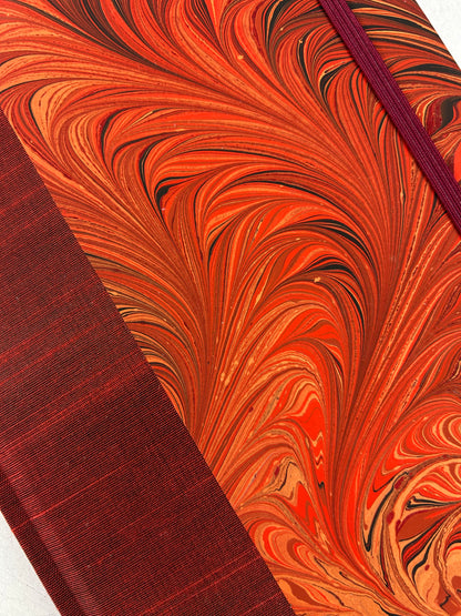 A5 160-page Hardcover Journal finished in Dark Red Japanese book cloth and hand marbled paper by Daniel Gaál