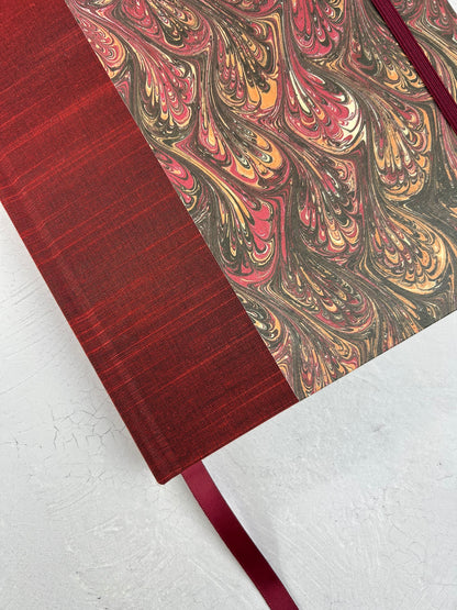 B5 192-page Hardcover Journal finished in Maroon Japanese book cloth and wine/black French Marbled Paper