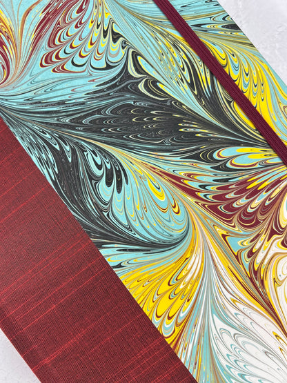 B5 192-page Hardcover Journal finished in Dark Red Japanese book cloth and hand marbled paper by Daniel Gaál