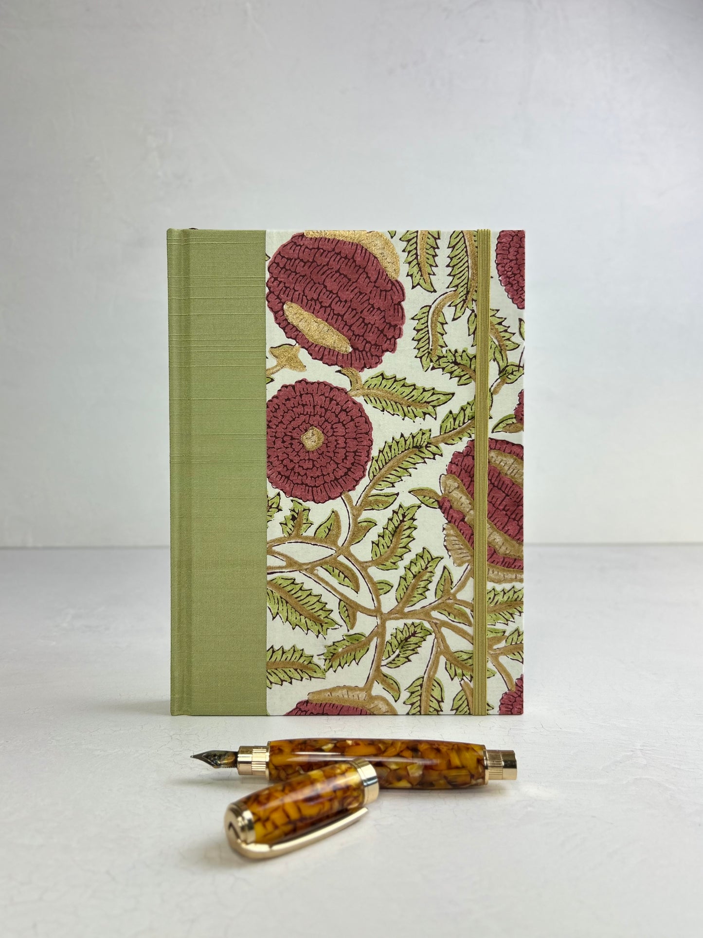A5 160-page Hardcover Journal finished in Celery Japanese book cloth and Red Floral Chiyogami Paper
