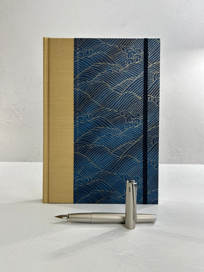 B5 192-page Hardcover Journal finished in soft gold Japanese book cloth and golden waves on blue Chiyogami Paper