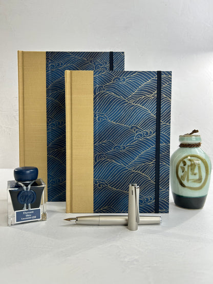 A5 160-page Hardcover Journal finished in soft gold Japanese book cloth and golden waves on blue Chiyogami Paper