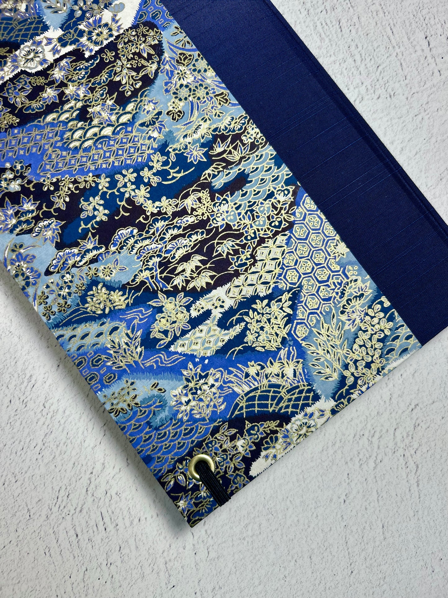 A5 Hardcover Notebook finished in Cadet Blue Japanese book cloth and vintage blue and purple Chiyogami decorative paper