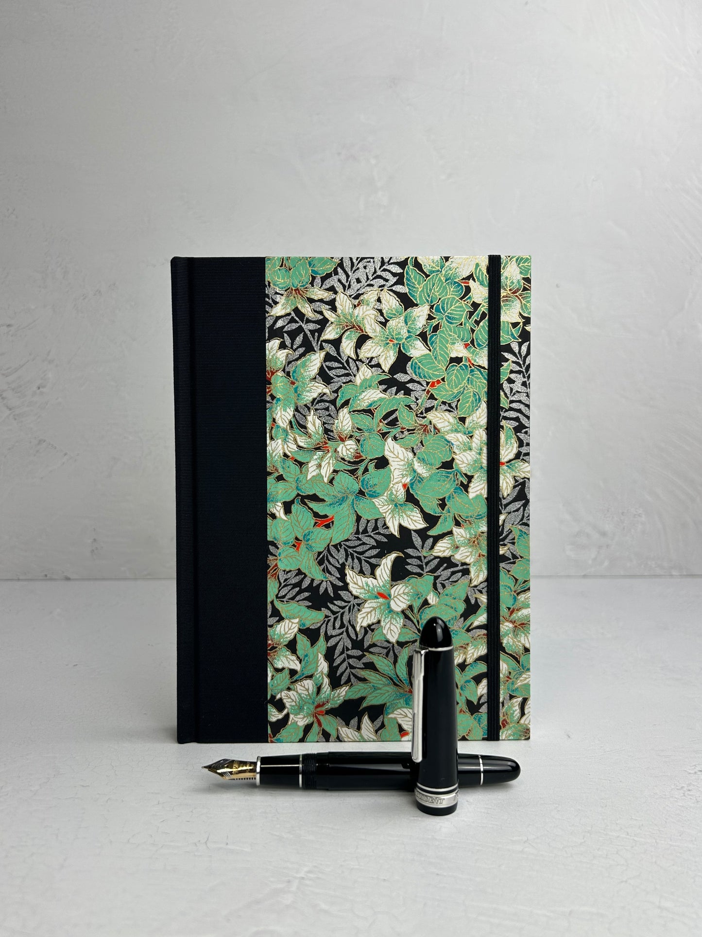 A5 160-page Hardcover Journal finished in black Japanese book cloth with green and silver botanical Chiyogami Paper