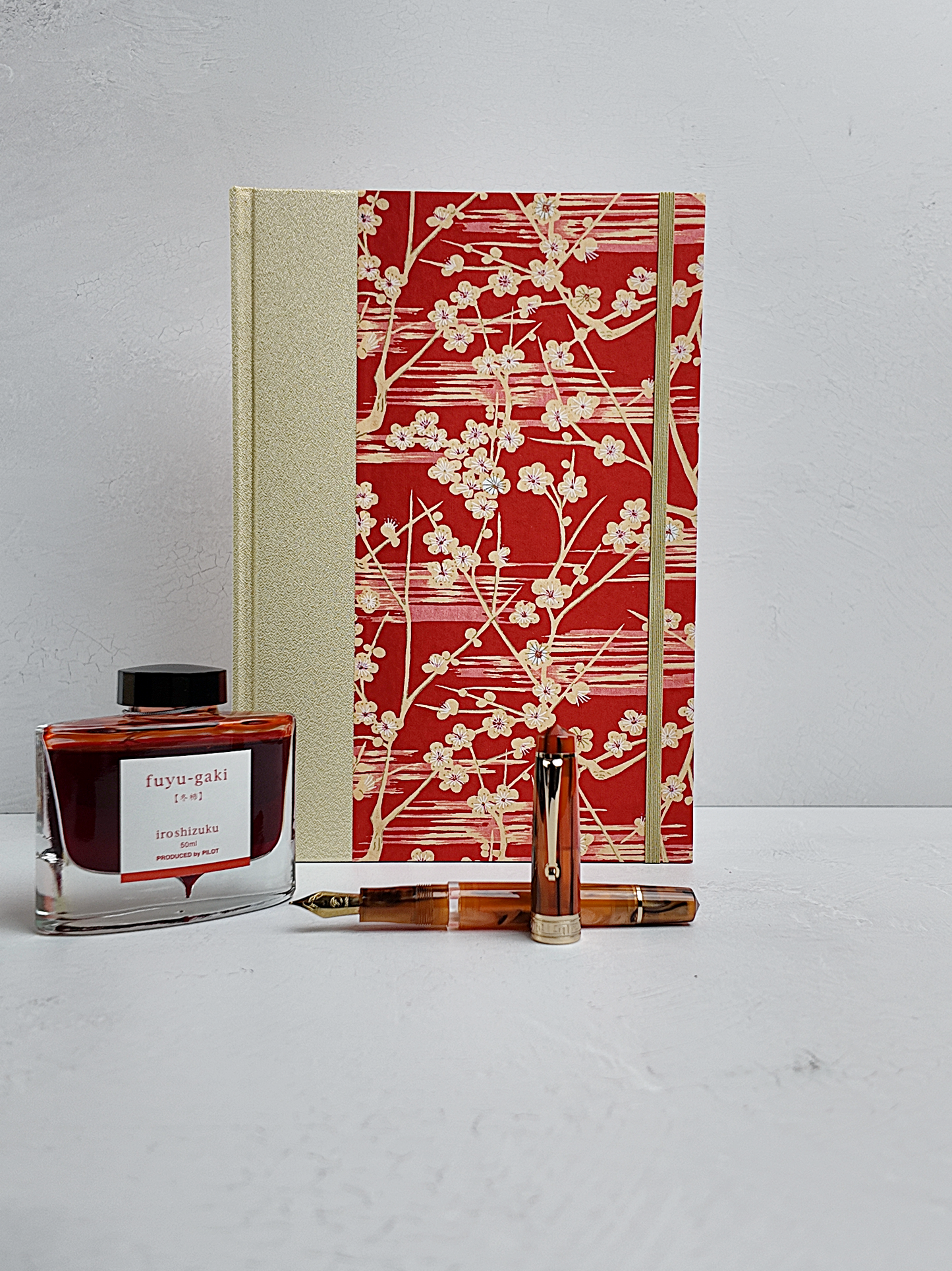 B5 192-page Hardcover Journal finished in Butter-Yellow Japanese Bookcloth and Red/Orange Chiyogami Paper