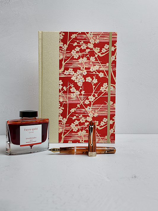 B5 192-page Hardcover Journal finished in Butter-Yellow Japanese Bookcloth and Red/Orange Chiyogami Paper