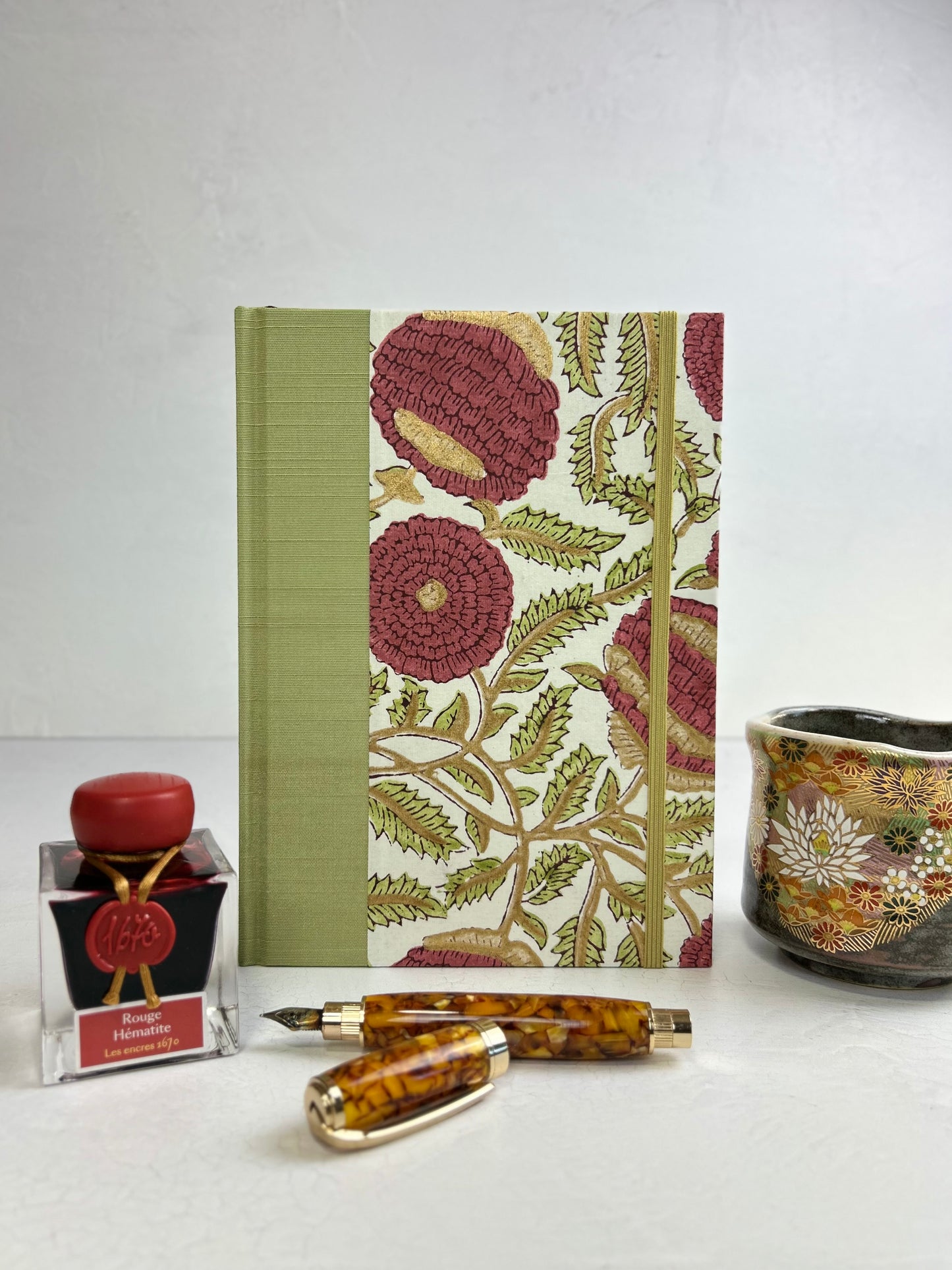 A5 160-page Hardcover Journal finished in Celery Japanese book cloth and Red Floral Chiyogami Paper