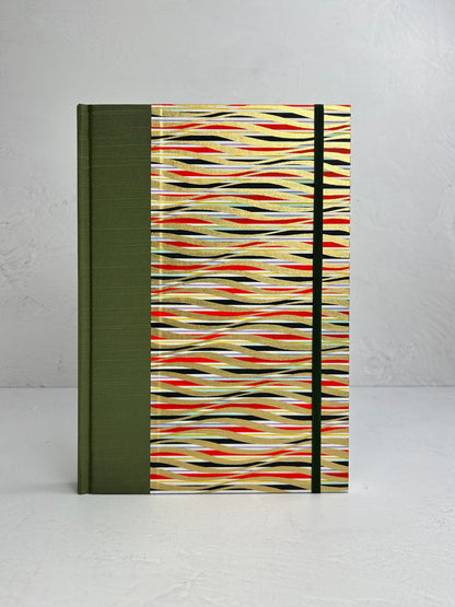 B5 192-page Hardcover Journal finished in olive green Japanese book cloth and gold, black and red geometric Chiyogami Paper