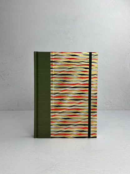 A5 160-page Hardcover Journal finished in olive green Japanese book cloth and gold, black and red geometric Chiyogami Paper