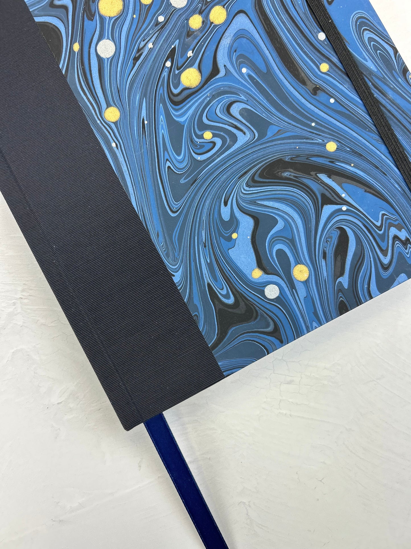 A5 160-page Hardcover Journal finished in Black Japanese book cloth and Renato Crepaldi hand marbled decorative paper