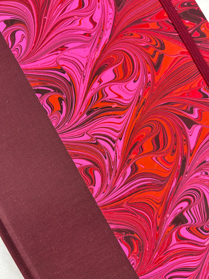 B5 192-page Hardcover Journal finished in Maroon Japanese book cloth and red/pink hand marbled paper by Daniel Gaál
