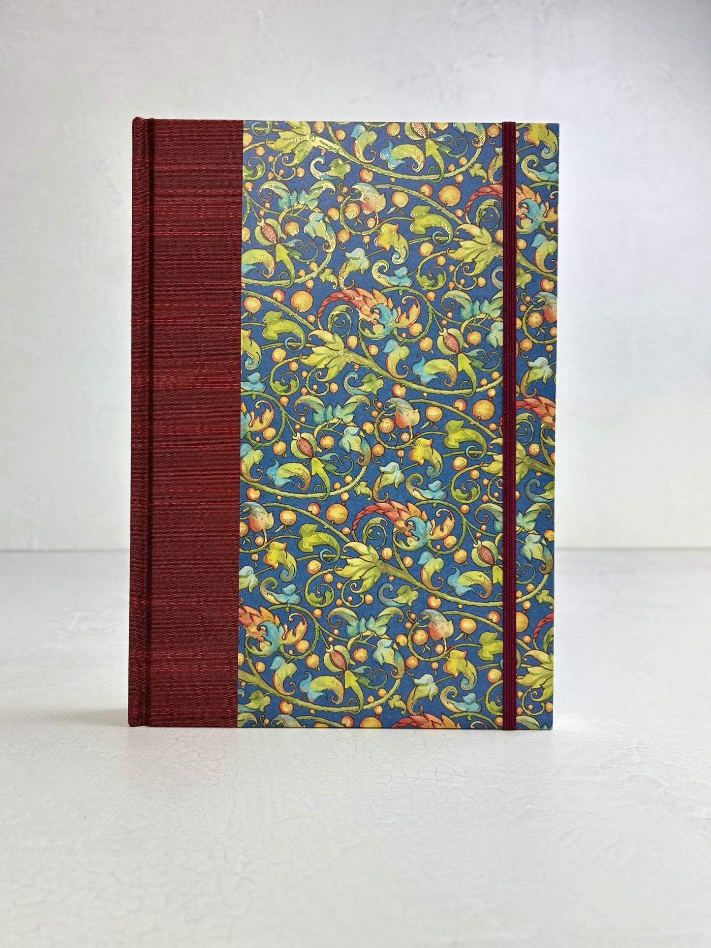 B5 192-page Hardcover Journal finished in Dark Red Japanese book cloth and Floral Italian Florentine Paper