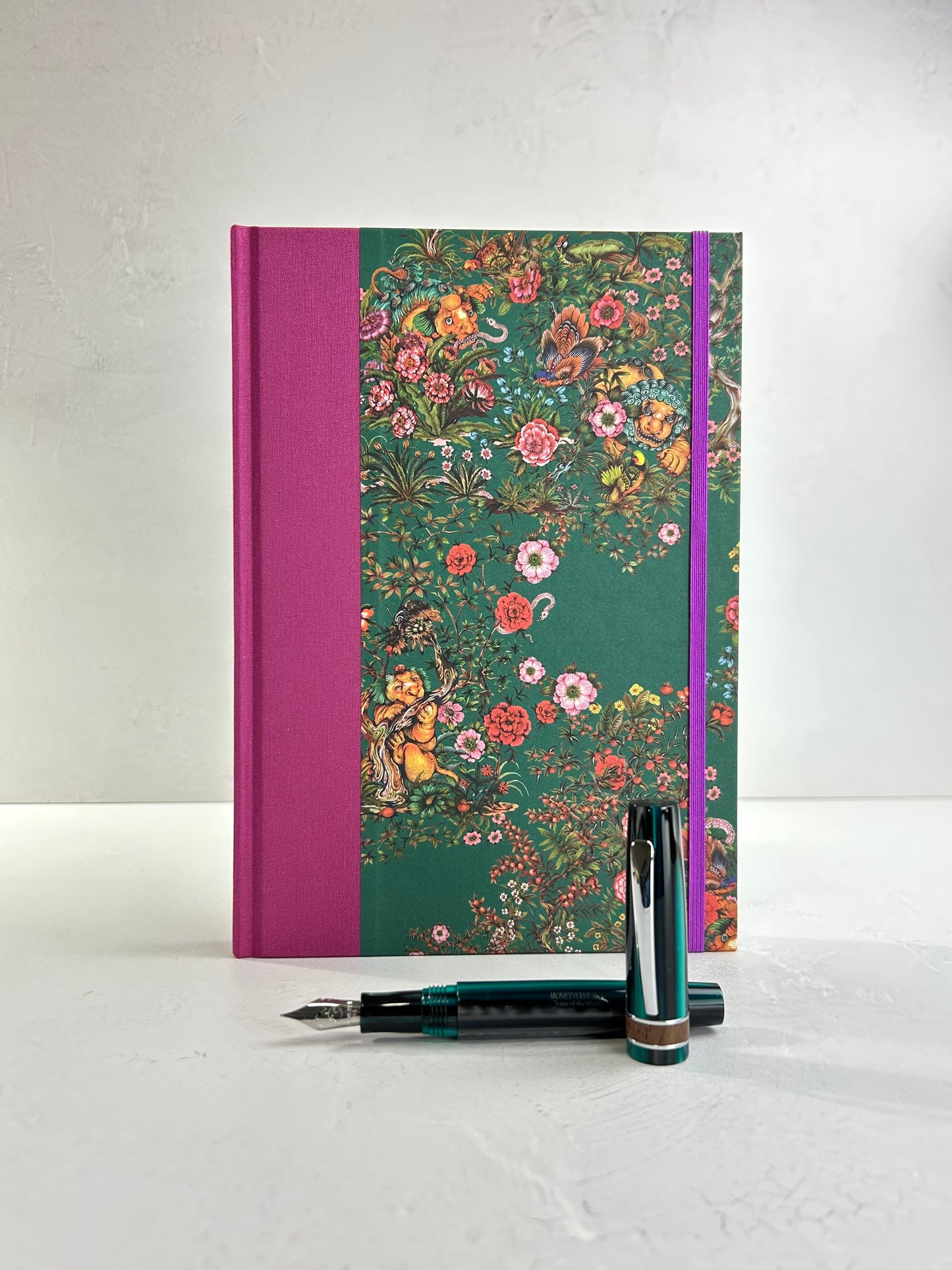 B5 192-page Hardcover Journal finished in Berry Bloom Verona book cloth and Oasis Print by Phannapast Taychamaythakool