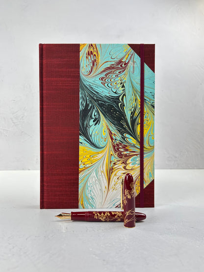 B5 192-page Hardcover Journal finished in Dark Red Japanese book cloth and hand marbled paper by Daniel Gaál