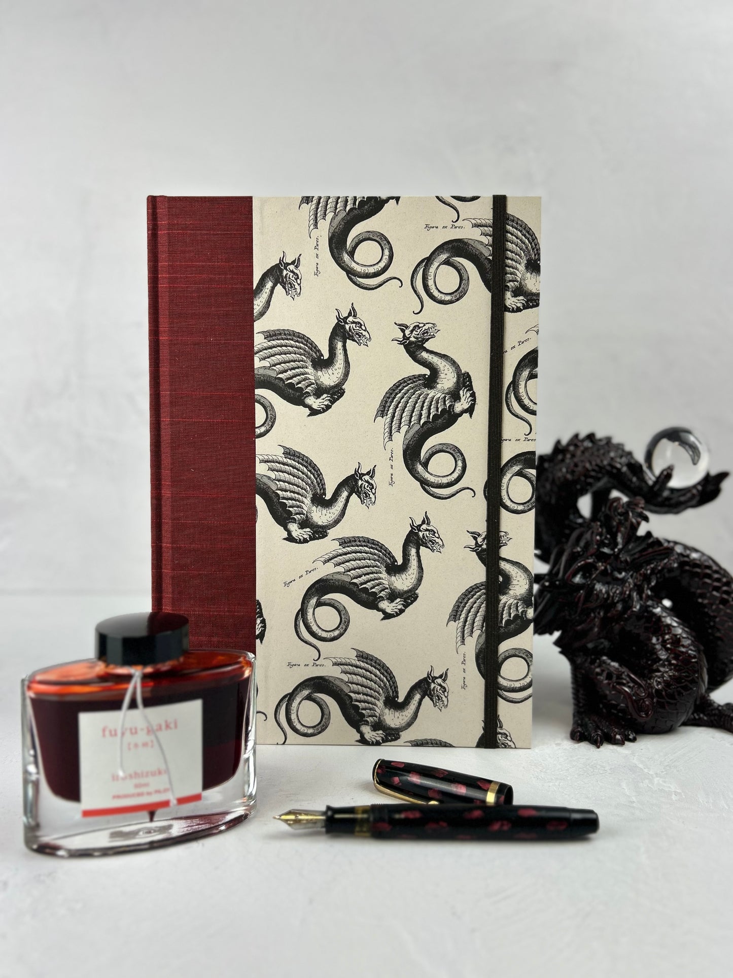 B5 Hardcover Notebook finished in Blood Red Japanese book cloth and Italian Medieval Letterpress Dragons Paper