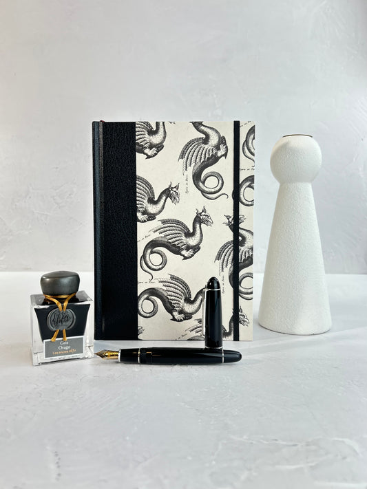 A5 160-page Hardcover Journal finished in Black Vaux Leather and Italian Letterpress dragon design