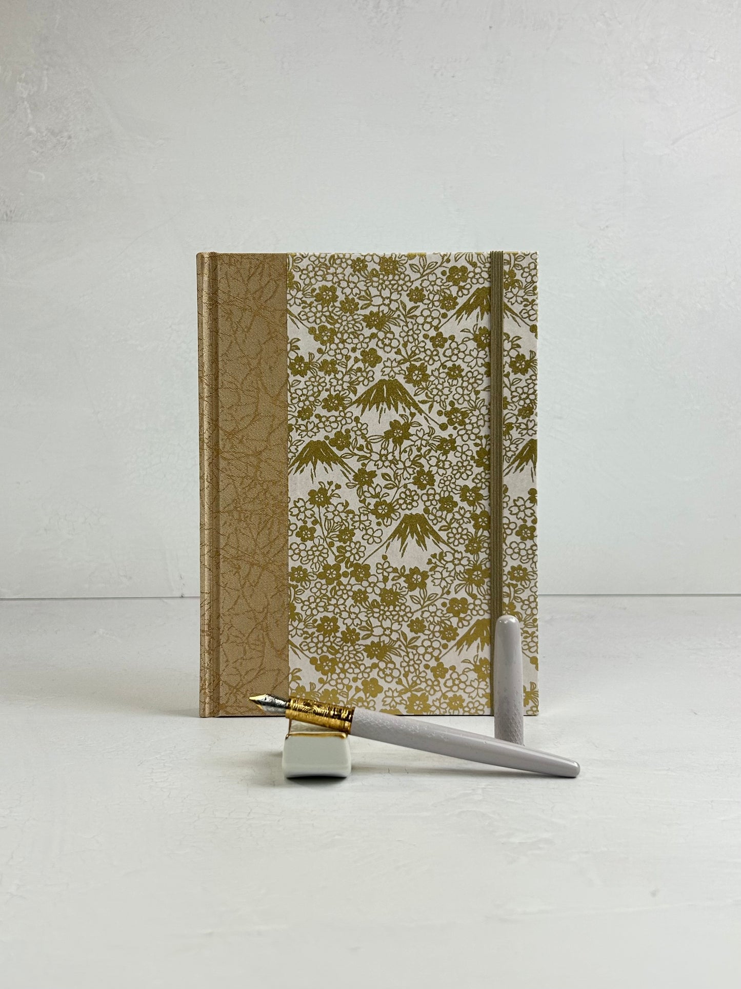 A5 160-page Hardcover Journal finished in Creme Satin Japanese book cloth and Gold on White Chiyogami Paper