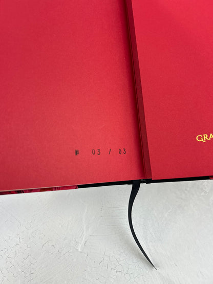 B5 192-page Hardcover Journal finished in Black Japanese book cloth and red hand marbled paper by Daniel Gaál