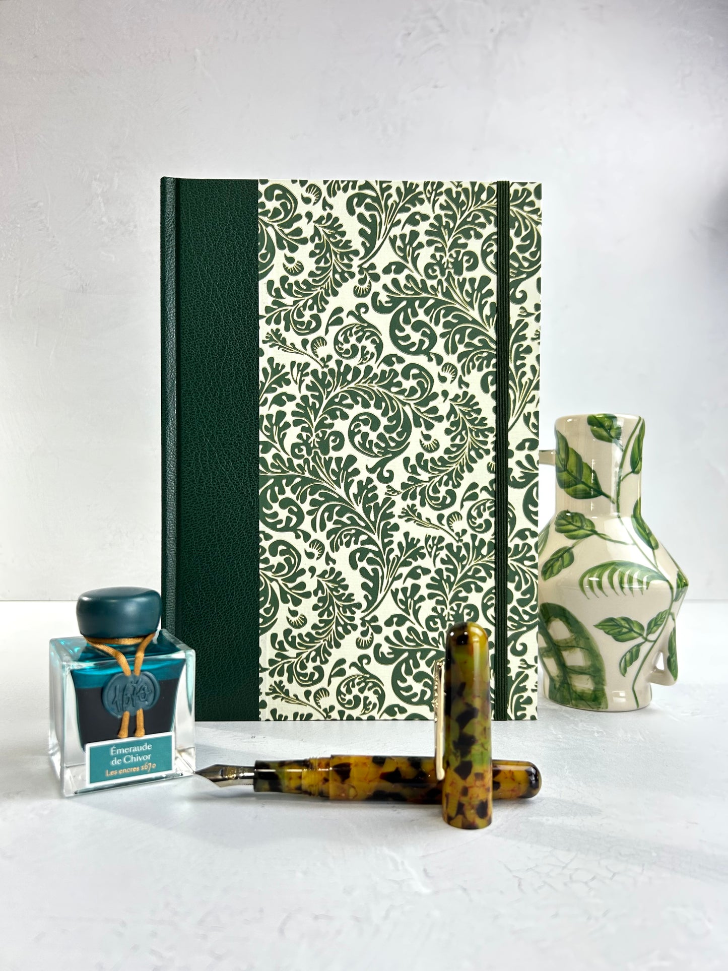 B5 192-page Hardcover Journal finished in Green Vaux Leather and green and gold fern Italian Florentine print