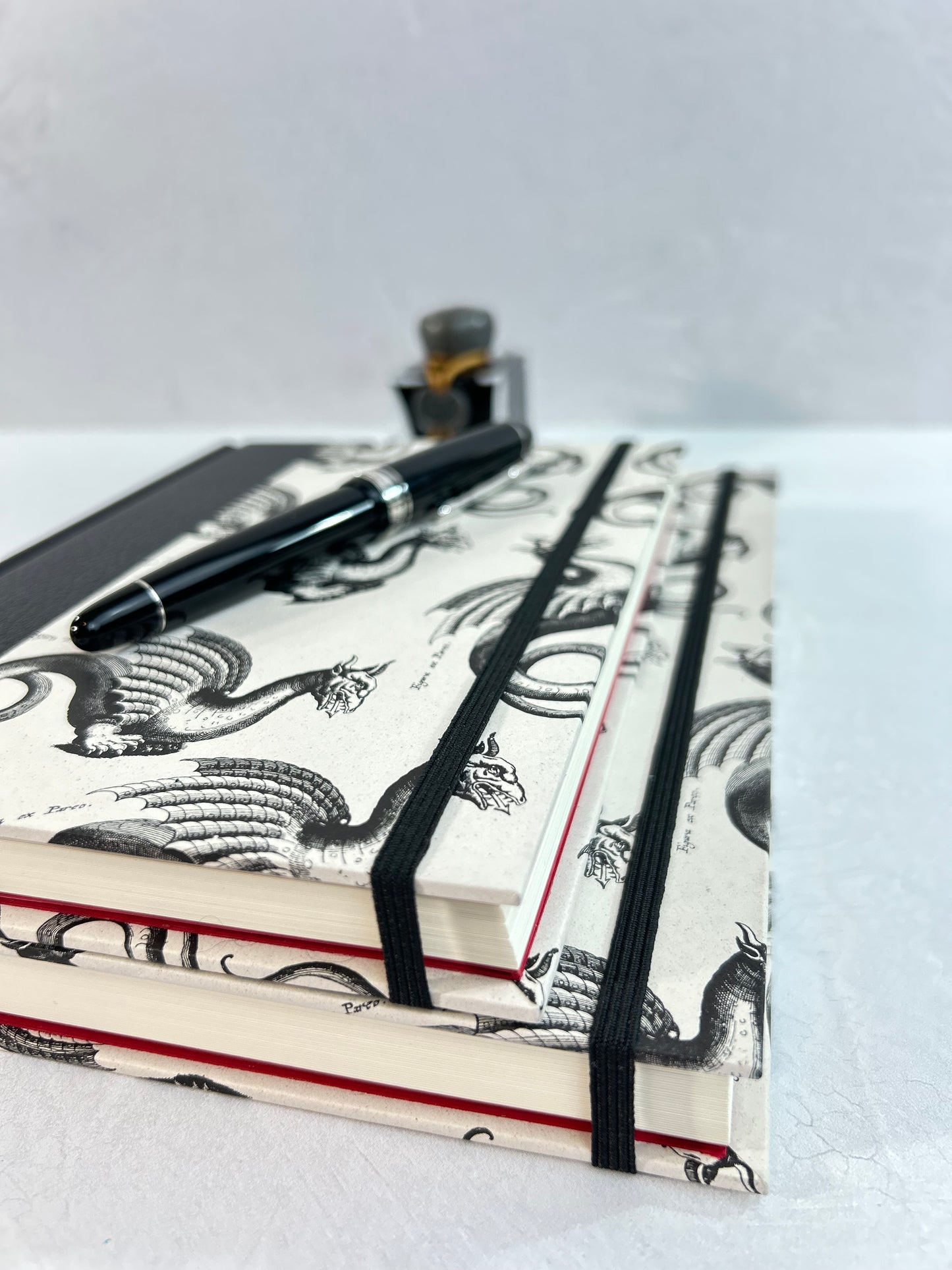 A5 160-page Hardcover Journal finished in Black Vaux Leather and Italian Letterpress dragon design