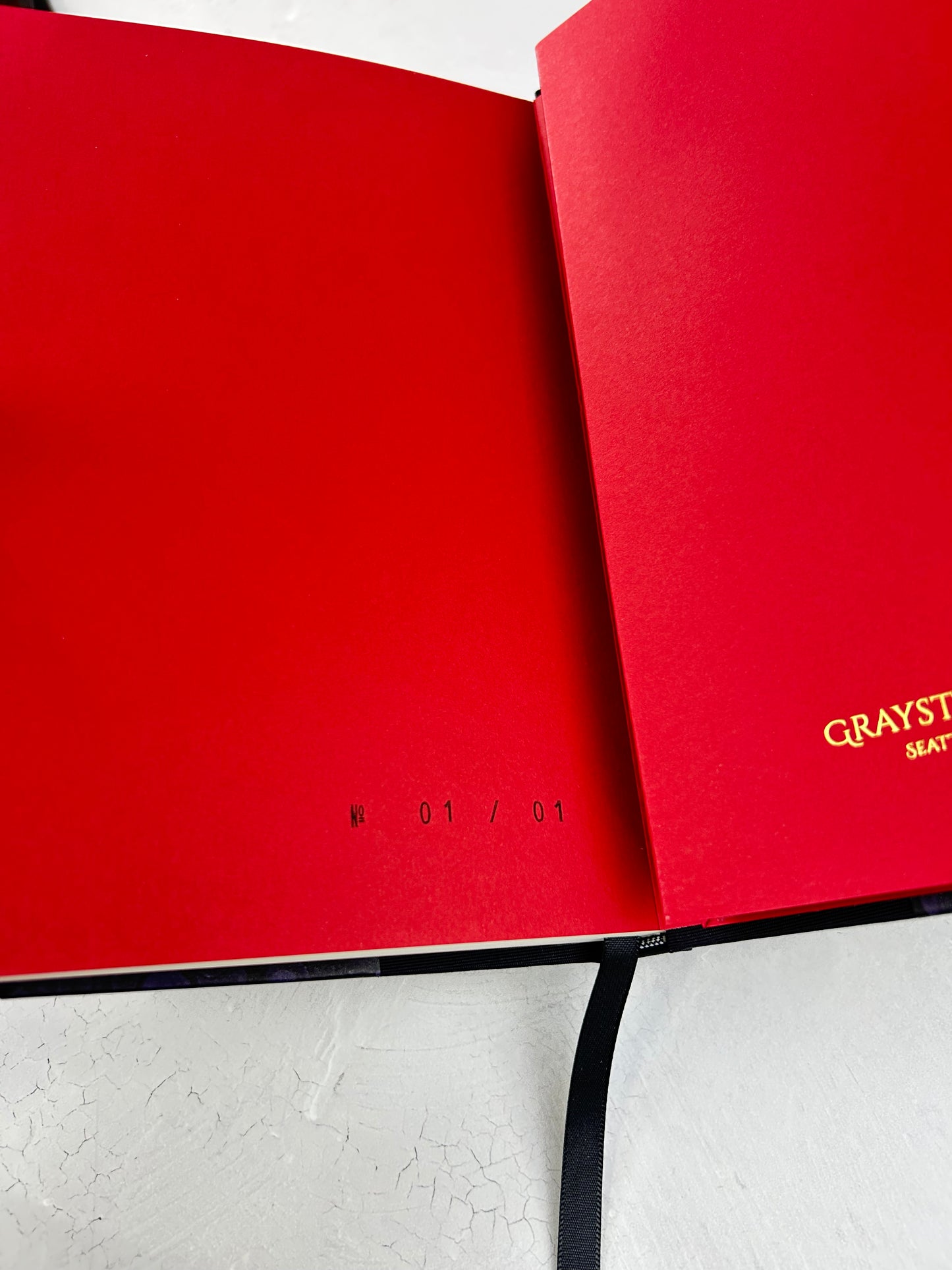 B5 192-page Hardcover Journal finished in Black Japanese book cloth and indigo hand marbled paper by Daniel Gaál