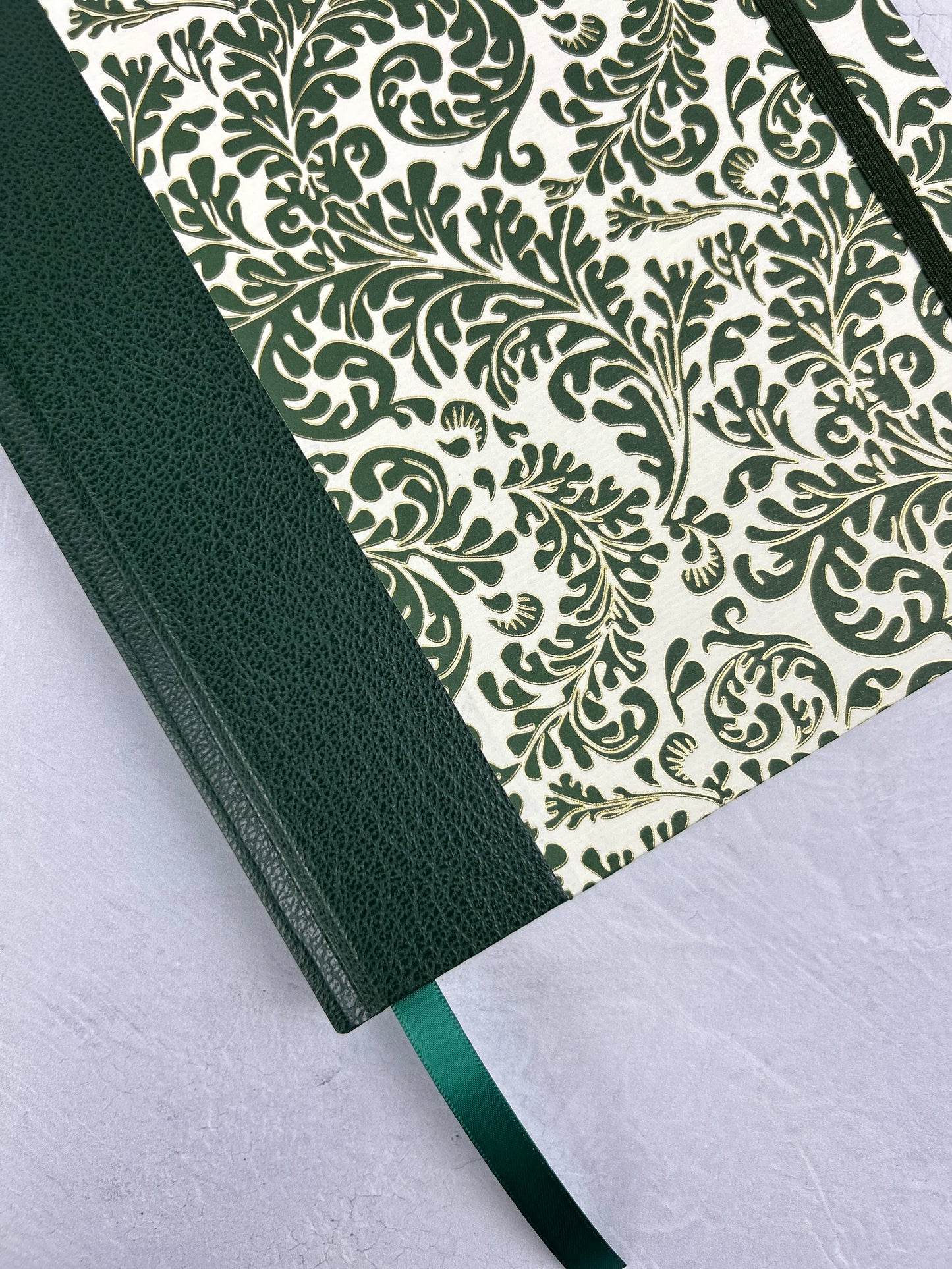 A5 160-page Hardcover Journal finished in Green Vaux Leather and green and gold fern Italian Florentine print