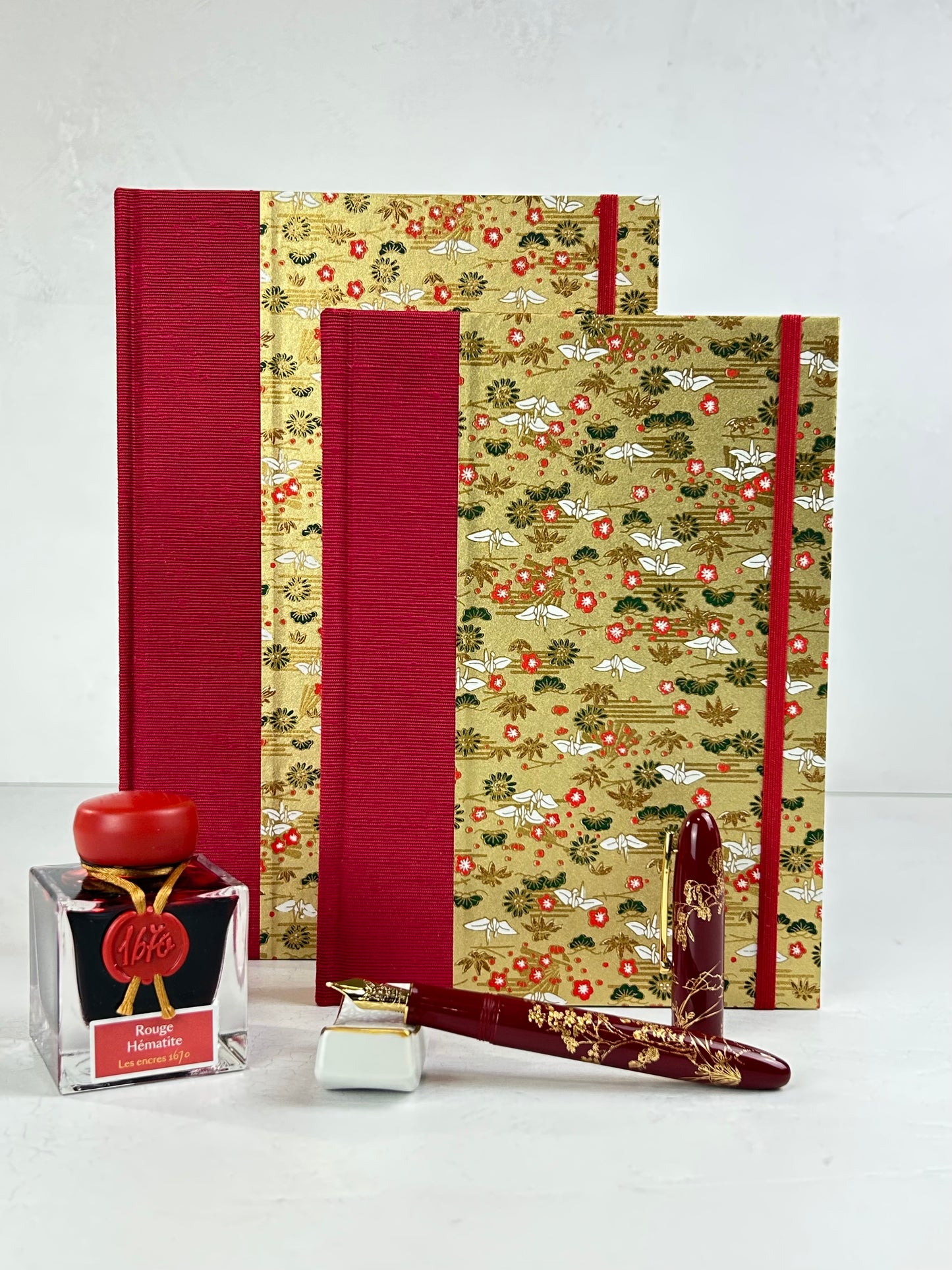 A5 160-page Hardcover Journal finished in Cardinal Red Japanese book cloth and White Cranes on Gold Chiyogami Paper