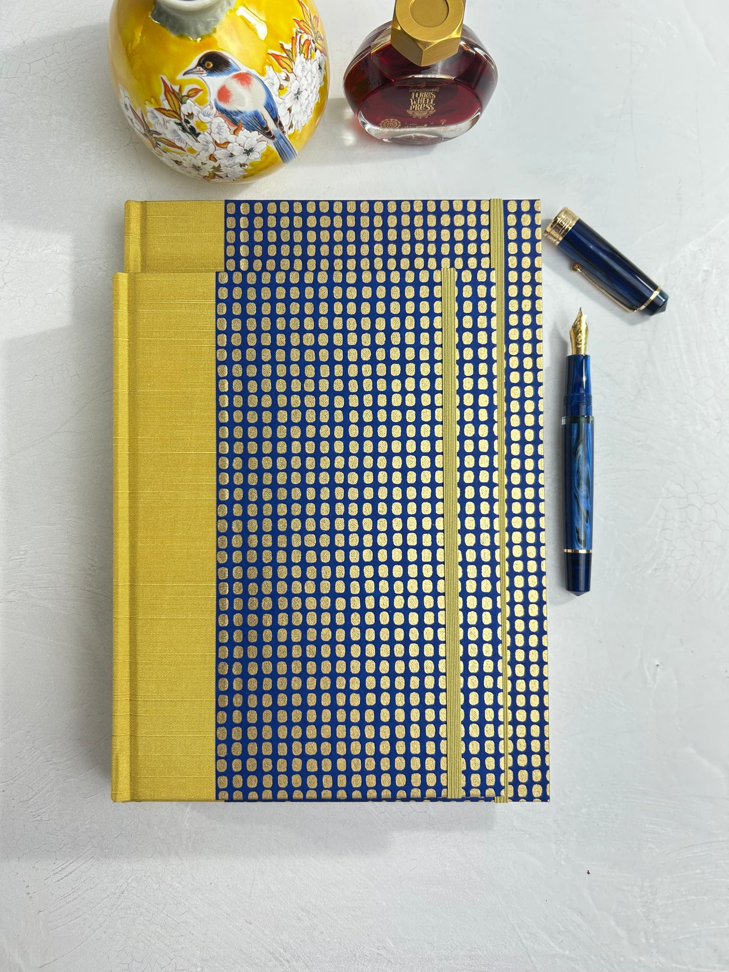 A5 160-page Hardcover Journal finished in Yellow Gold Japanese book cloth and blue and gold Chiyogami Paper