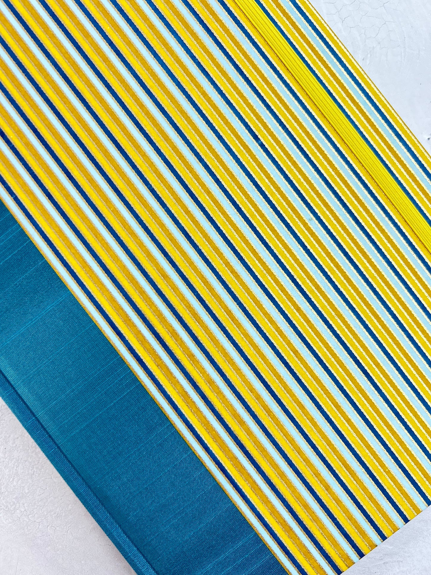 A5 160-page Hardcover Journal finished in Marine Blue Japanese book cloth and pinstripe Chiyogami Paper