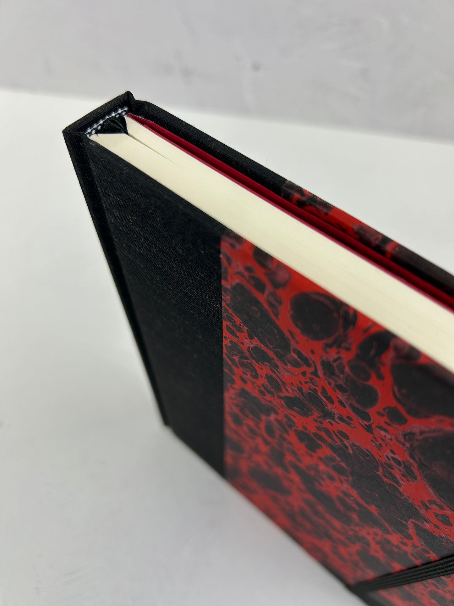 A5 160-page Hardcover Journal finished in Black Mohair Japanese book cloth and hand marbled paper by Daniel Gaál