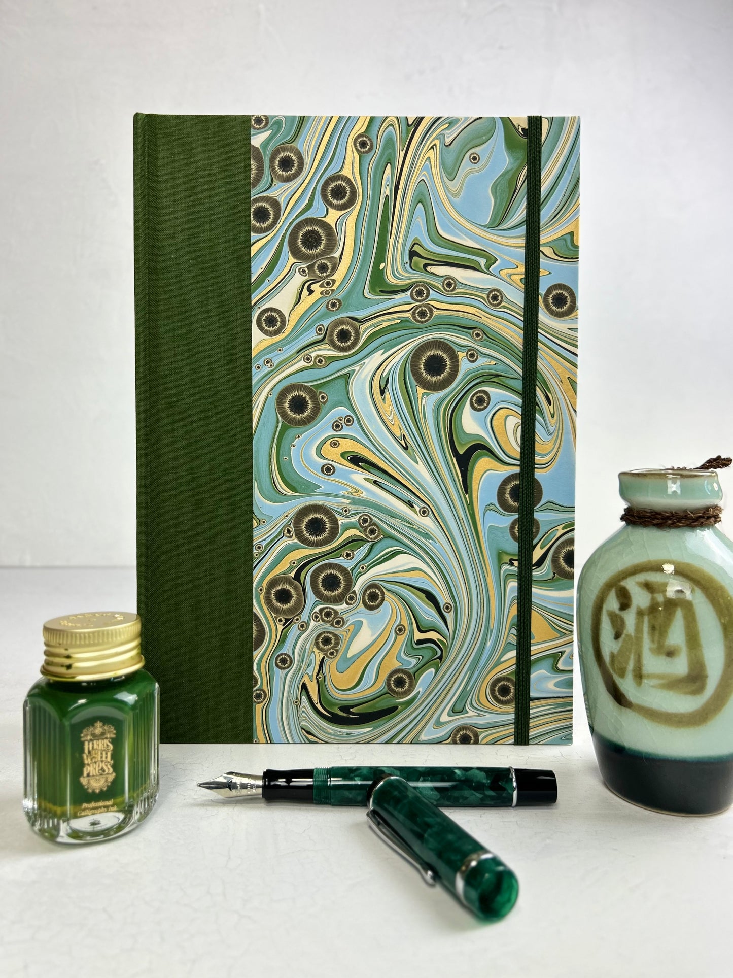 B5 192-page Hardcover Journal finished in Olive Italian Verona book cloth and Renato Crepaldi hand marbled decorative paper