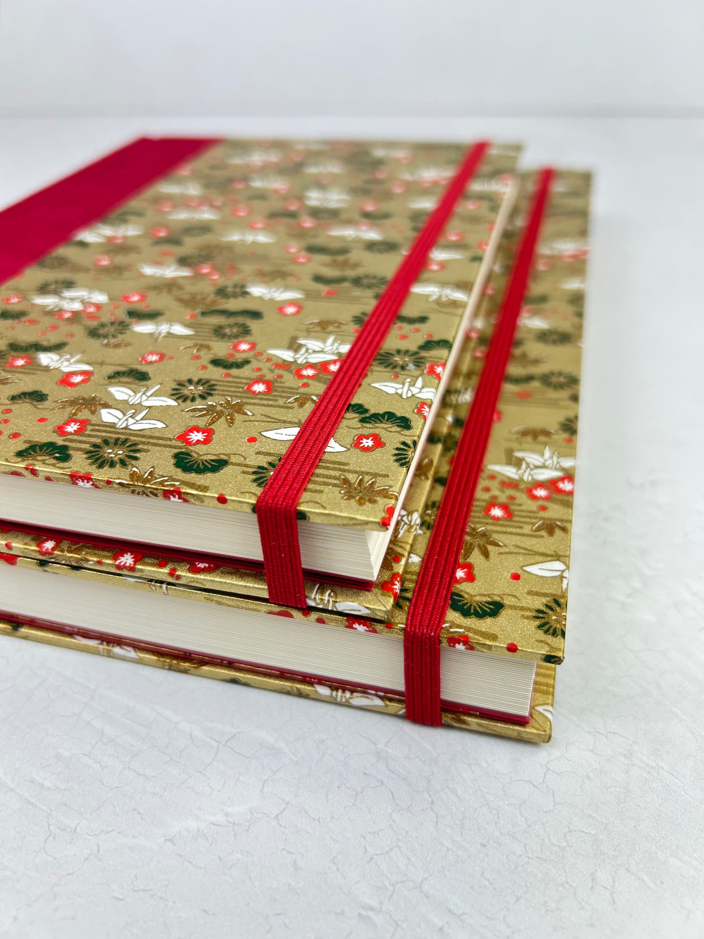 A5 160-page Hardcover Journal finished in Cardinal Red Japanese book cloth and White Cranes on Gold Chiyogami Paper