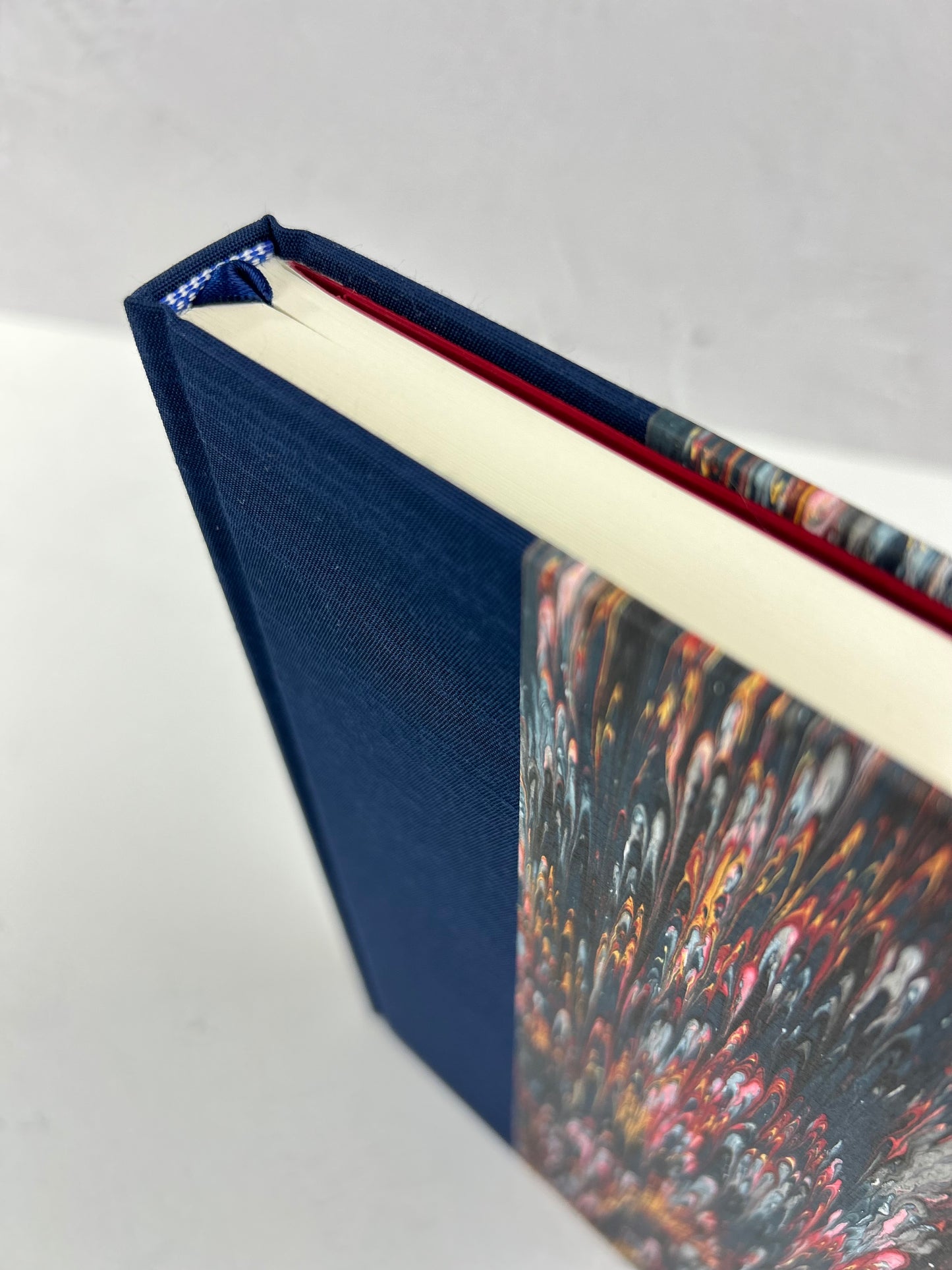 A5 160-page Hardcover Journal finished in Cadette Blue Japanese book cloth and French Marbled Paper
