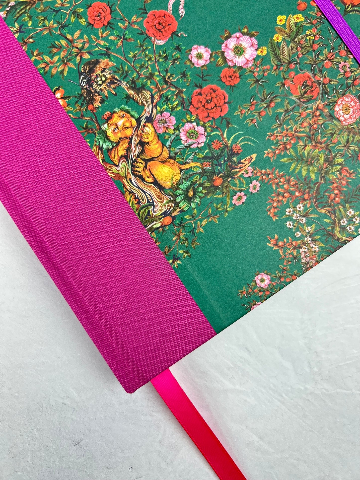 B5 192-page Hardcover Journal finished in Berry Bloom Verona book cloth and Oasis Print by Phannapast Taychamaythakool