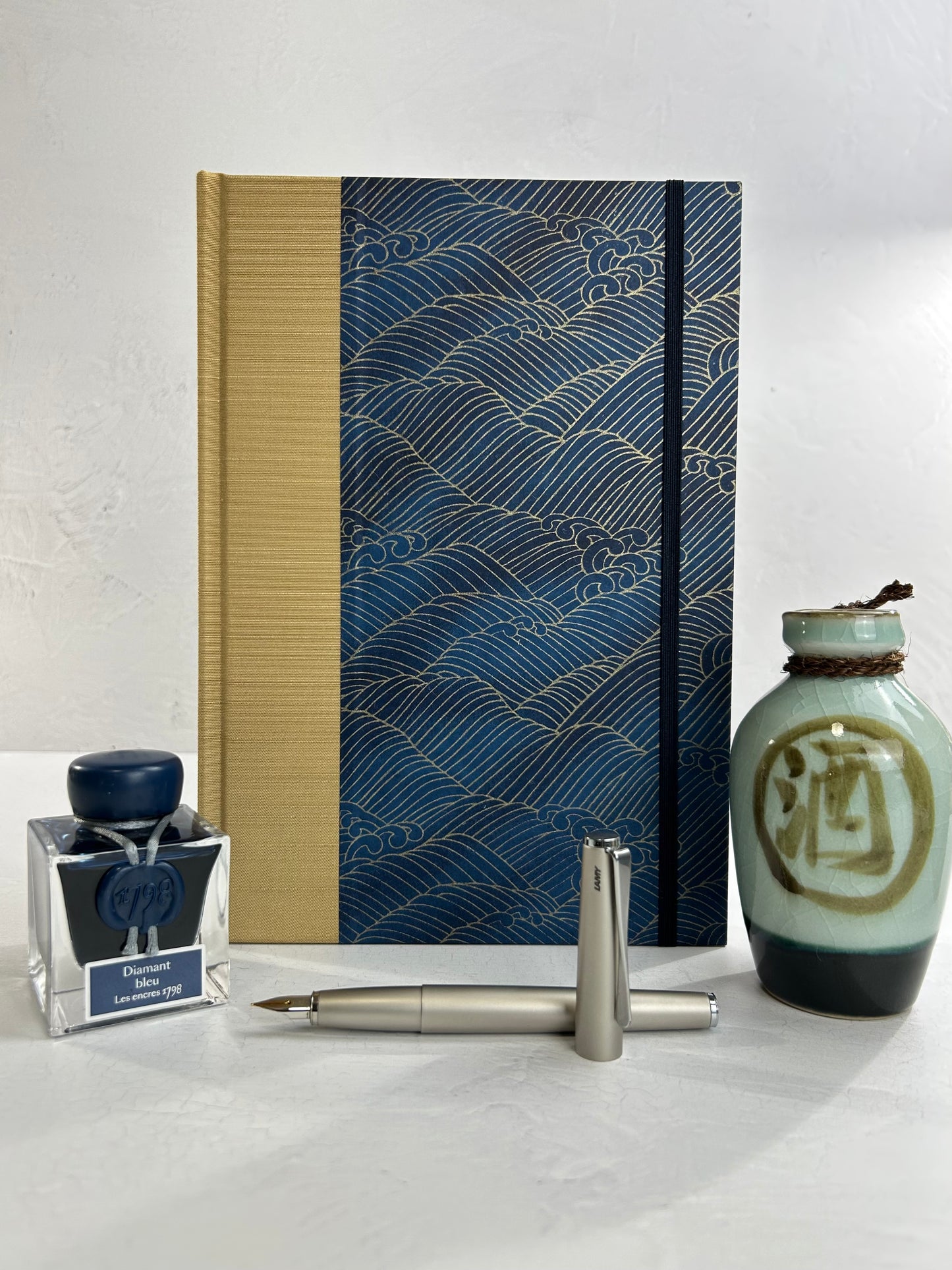 B5 192-page Hardcover Journal finished in soft gold Japanese book cloth and golden waves on blue Chiyogami Paper
