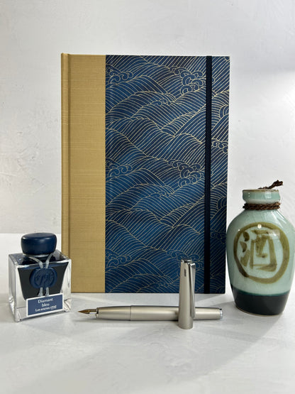 B5 192-page Hardcover Journal finished in soft gold Japanese book cloth and golden waves on blue Chiyogami Paper