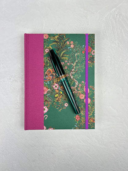 A5 160-page Hardcover Journal finished in in Berry Bloom Verona book cloth and Oasis Print by Phannapast Taychamaythakool