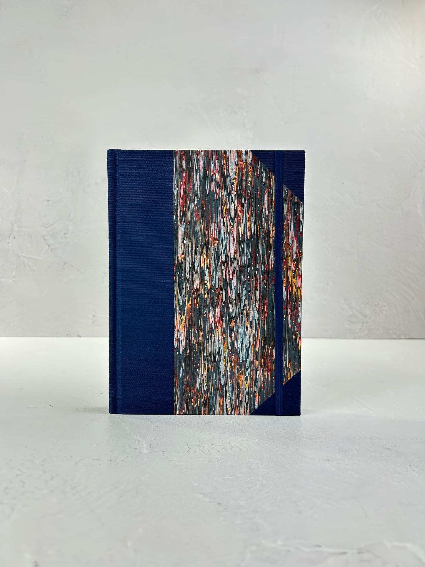 A5 160-page Hardcover Journal finished in Cadette Blue Japanese book cloth and French Marbled Paper