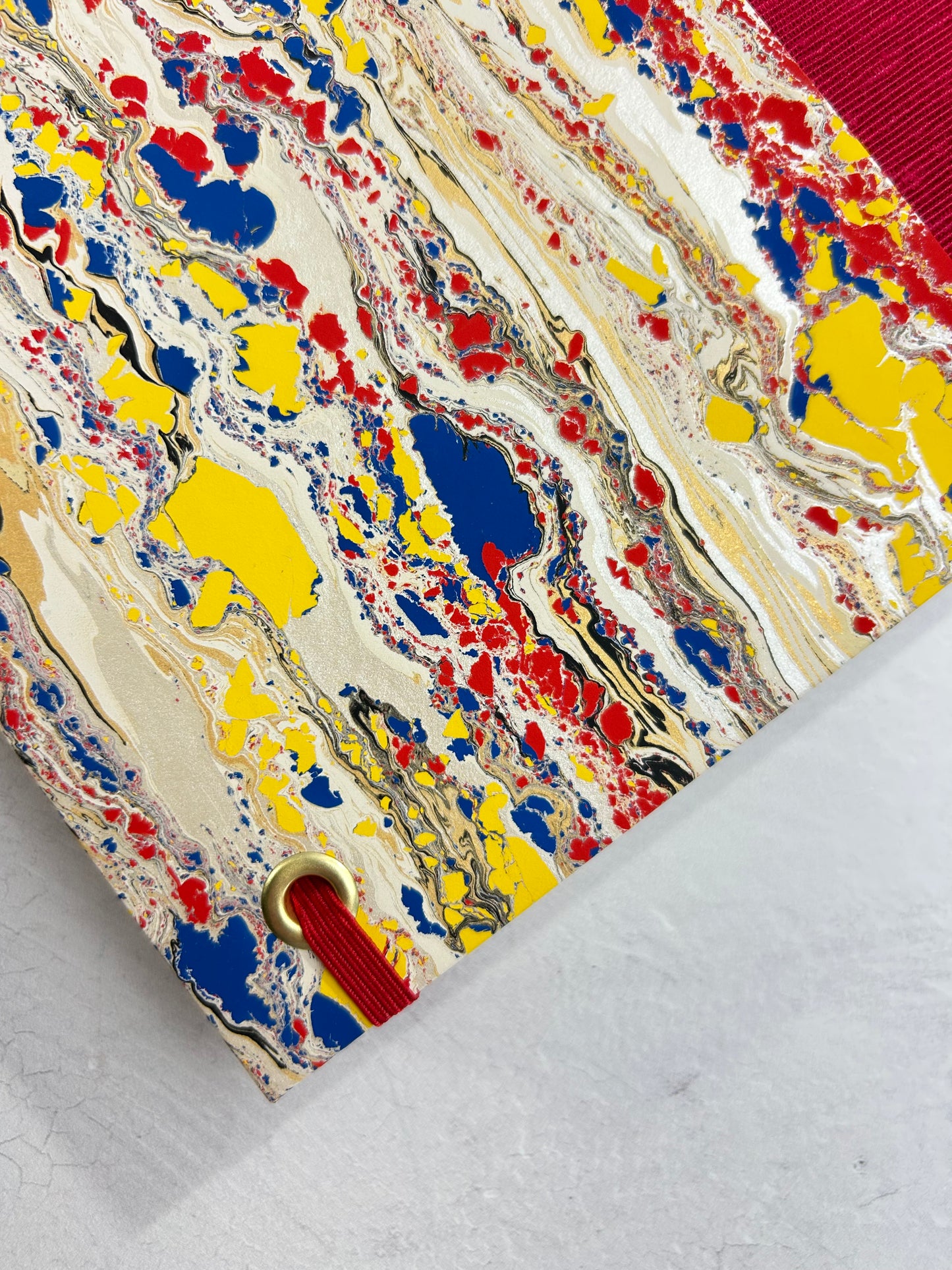 B5 192-page Hardcover Journal finished in Cardinal Red Japanese book cloth and Italian hand-marbled paper by Renato Crepaldi