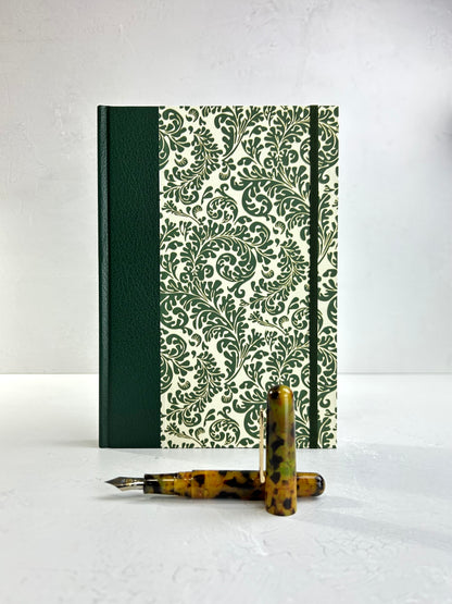 B5 192-page Hardcover Journal finished in Green Vaux Leather and green and gold fern Italian Florentine print