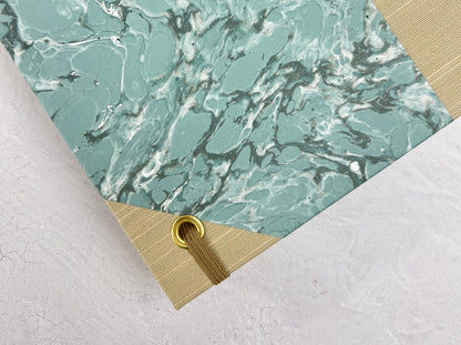 A5 160-page Hardcover Journal finished in Platinum Japanese book cloth and light blue French Marble Paper