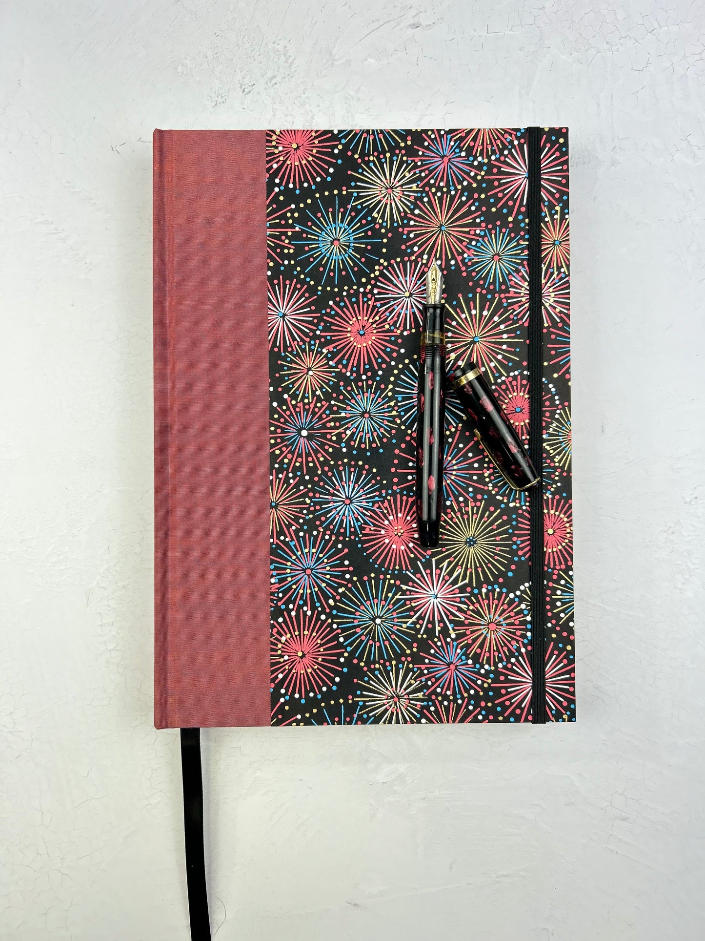 (JANUARY 2026 DELIVERY) B5 Hardcover Notebook finished in Rust Blue Japanese book cloth and Chiyogami Fireworks on Black