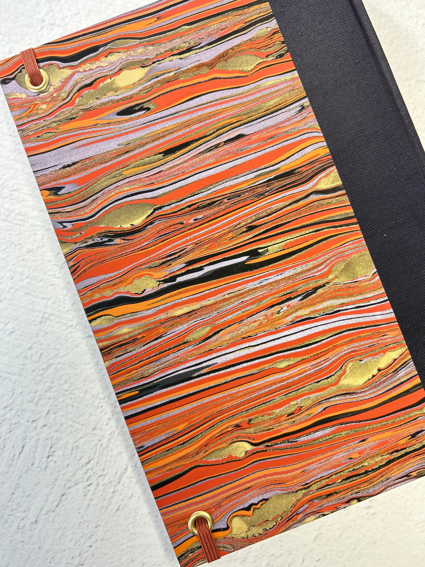A5 Hardcover Notebook finished in Black Japanese book cloth and Renato Crepaldi hand marbled paper