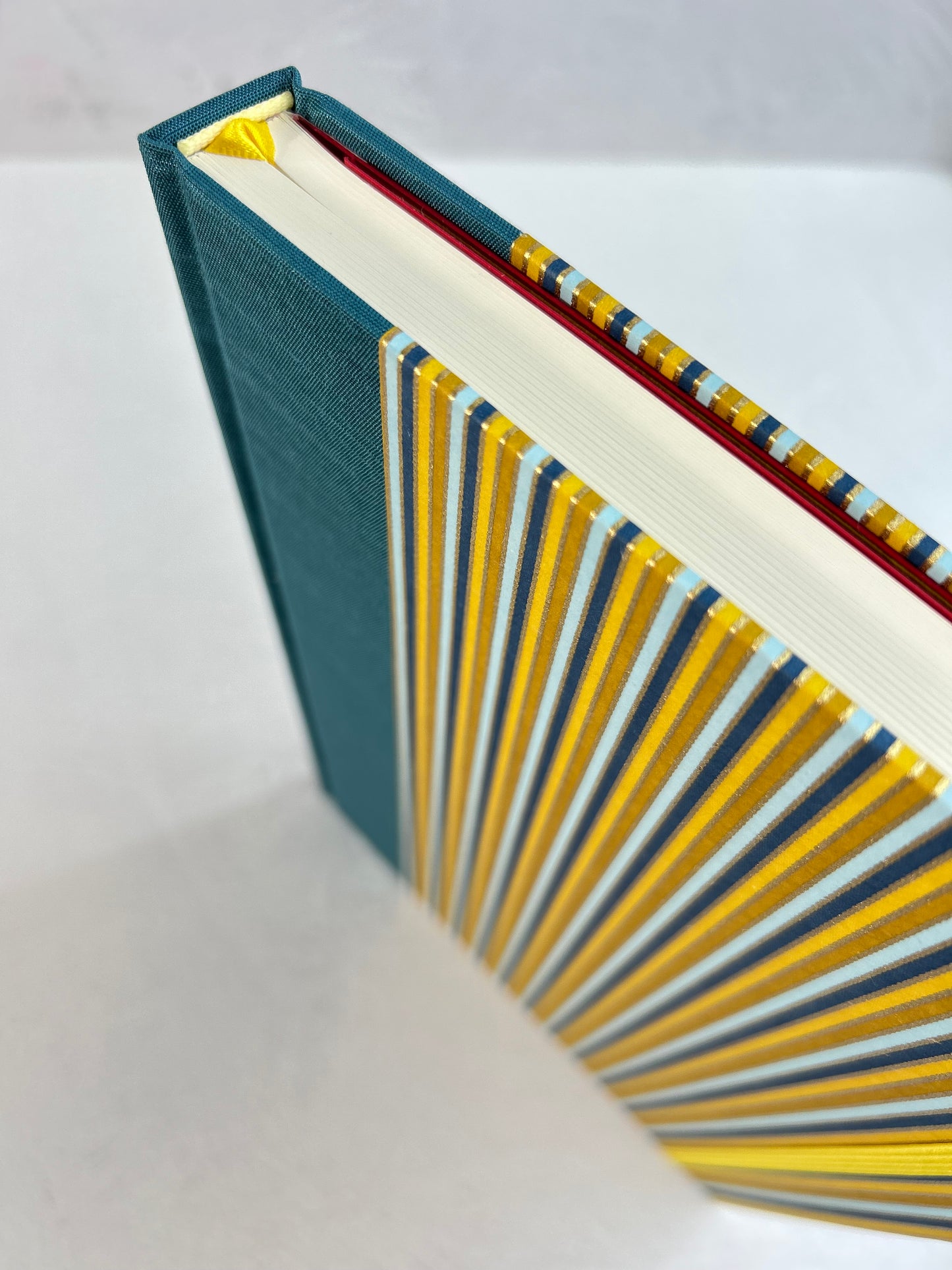 A5 160-page Hardcover Journal finished in Marine Blue Japanese book cloth and pinstripe Chiyogami Paper