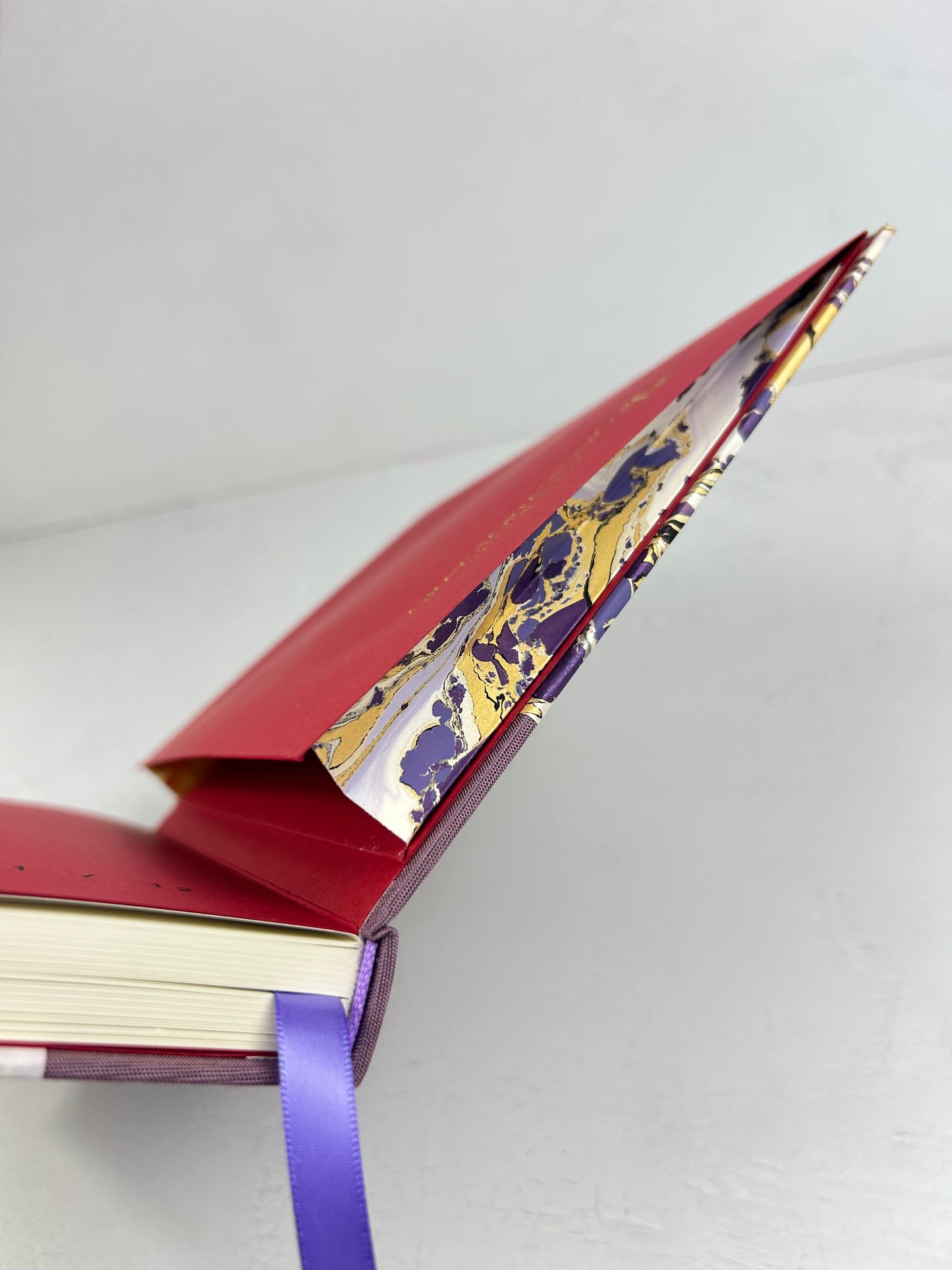 B5 192-page Hardcover Journal finished in plum Japanese book cloth and hand marbled paper by Renato Crepaldi