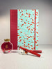 B5 Hardcover Notebook finished in Scarlet Red Japanese Bookcloth and Red/Orange Koi Fish on Aqua Chiyogami Paper